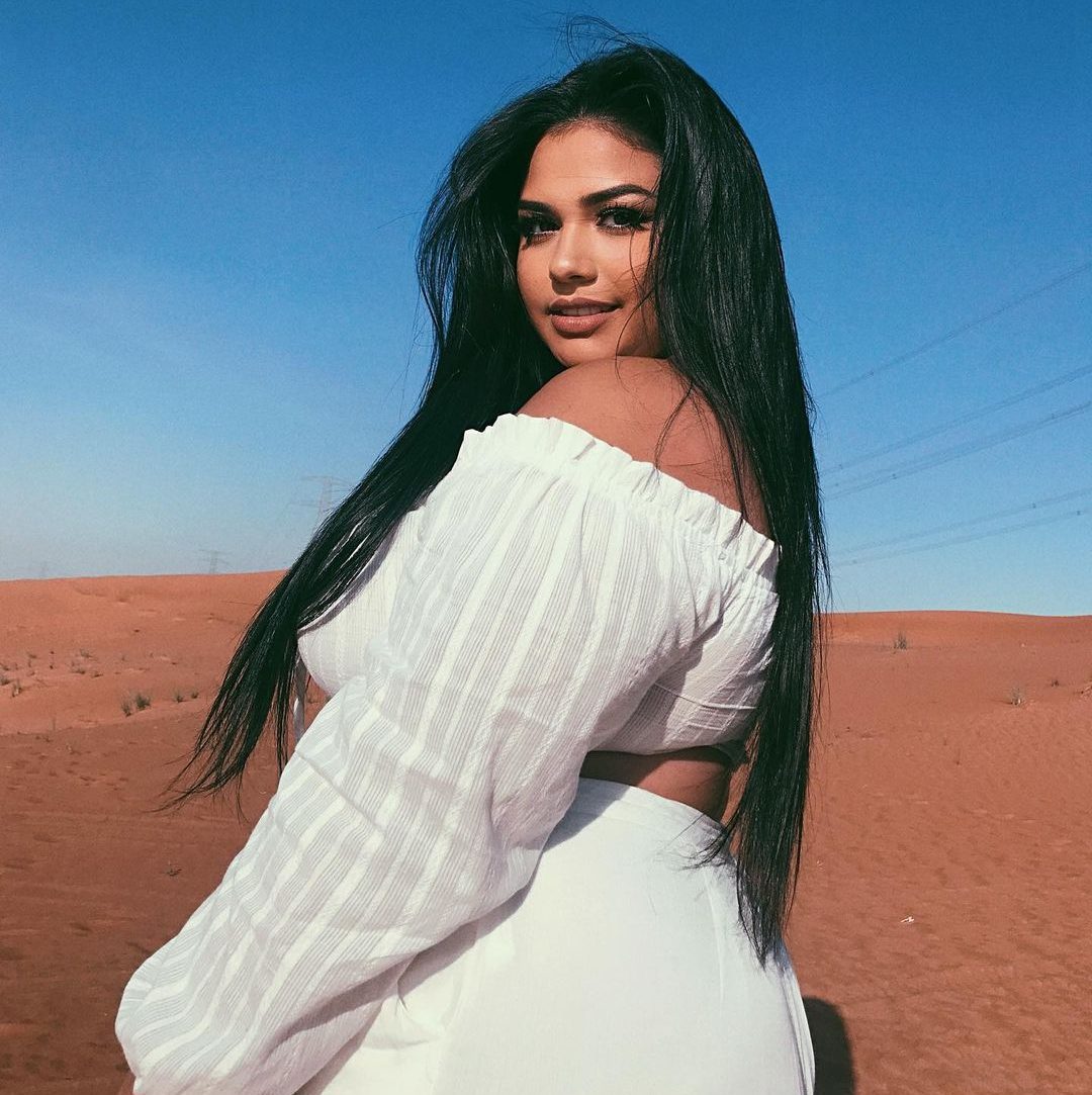 Diana Sirakoi in white outfit enjoying in desert